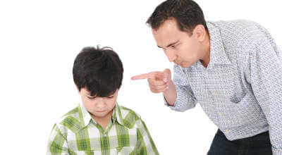 Man scolding son