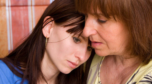 woman showing compassion and care for another woman