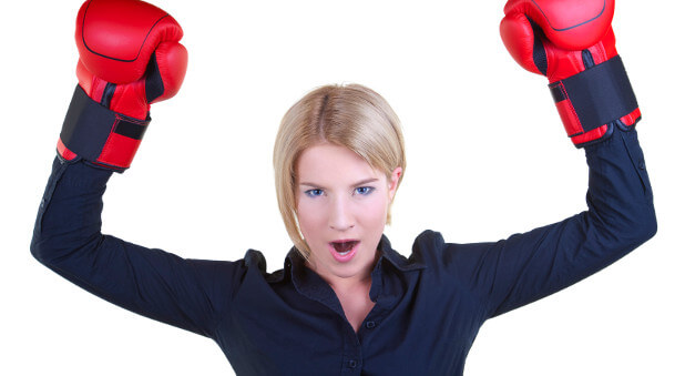 woman holding boxing gloves