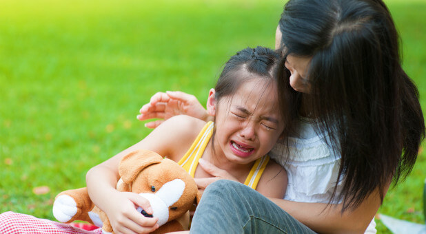 crying child with mom