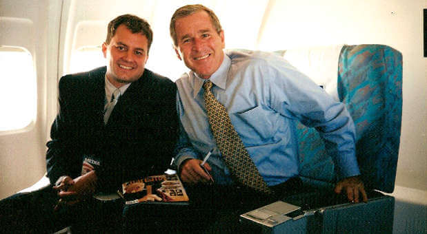 Former Charisma editor Lee Grady (l) with presidential candidate George W. Bush in August 2000.