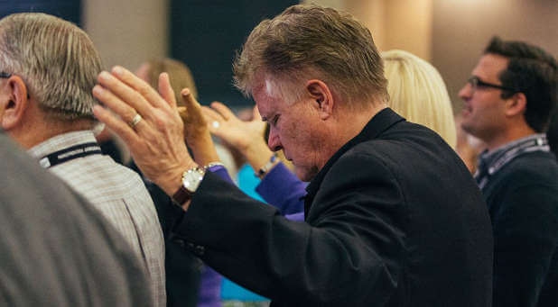 Pastor Jim Garlow in a file photo shown praying.