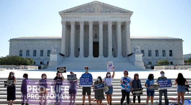 Supreme Court Saves Abortion After Roberts Sides With Liberal Justices