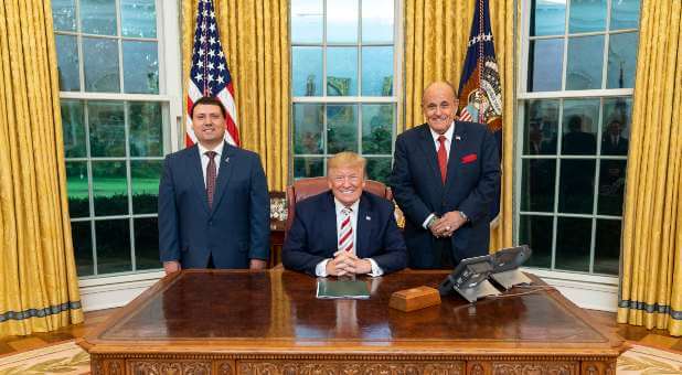 Xavier DeGroat with former President Donald J. Trump and former New York City Mayor Rudy Giuliani